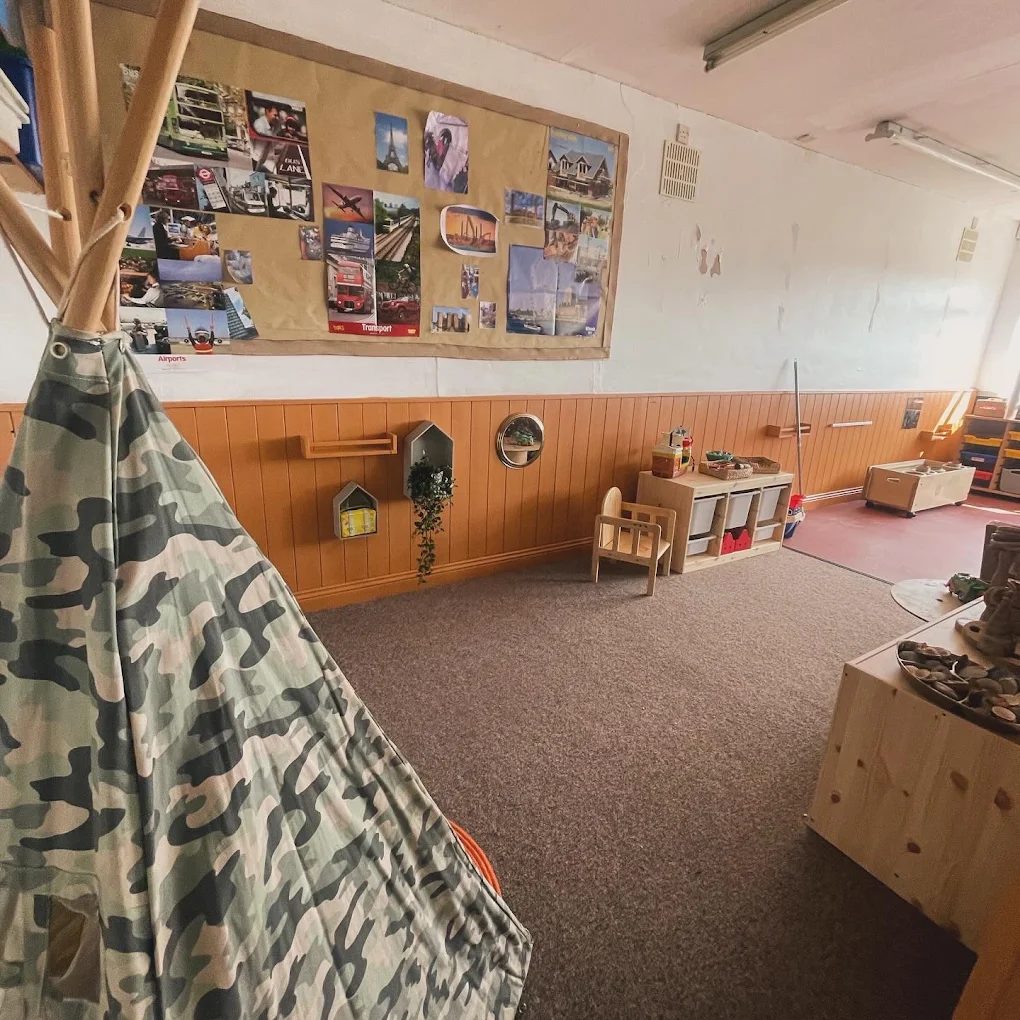 Pre-school room with a play tent and topic display